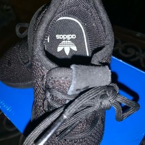 Tenis shoes. “”adidas””